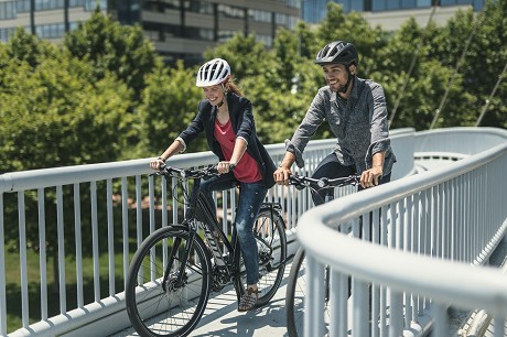 Right Bike Cyclists on bridge Right Bike Cyclists on bridge